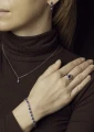 Białe złoto - pierścionek ozdobiony szafirem i diamentem