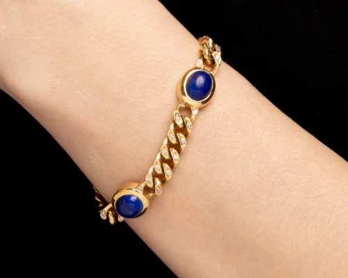 Złota bransoletka z lapis lazuli i diamentami masy ok. 0,50 karata