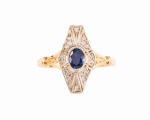Złoty pierścionek z szafirem ok. 0,50 ct i diamentami ok. 0,14 ct